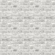 a white brick wall with grey bricks on it