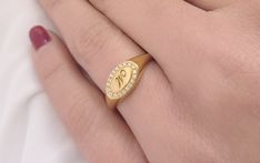 This is a custom diamond oval signet ring for women, made of solid gold in 9k,14K,18k, hallmarked accordingly 373-585-750. This solid gold ring is set with natural diamonds. You can choose between the hollow back and full back (see the last picture). A traditional and personal symbol, the signet has been around for as long as time. Traditionally, signet rings are worn on the pinky finger of your non-dominant hand. Nowadays, you can wear our oval ring on any finger, and take the classic monogram Oval Diamond Ring Gift, 14k Diamond Signet Ring Gift, Oval Cubic Zirconia Signet Ring With Brilliant Cut, Diamond Signet Ring Fine Jewelry For Gift, Diamond Signet Ring With Vvs Clarity As Gift, Oval Diamond White Signet Ring, Luxury Oval Cubic Zirconia Signet Ring, Diamond White Signet Ring As A Gift, Diamond Signet Ring As A Gift