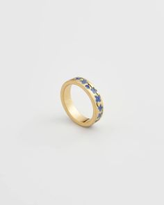 A dainty gold band adorned with delicate hand-painted enamel Forget Me Not flowers, encircling it in a timeless embrace. This ring captures the essence of everlasting love and the enduring beauty of nature. Key features: Hand-painted enamel 18K Worn-gold plated brass, enamel 5mm width band; 2mm thick-rounded Small: US6 Forget Me Not Ring, Dainty Gold Band, Fable England, Forget Me Not Flowers, Gold Band Ring, Jewelry Lookbook, Ring Pendant, Everlasting Love, Forget Me Not