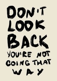 the words don't look back you're not going that way are black and white