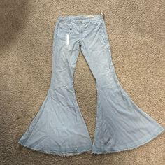 In Great Condition, Never Worn. Spring Blue Cotton Flare Jeans, Light Wash High Rise Flares For Spring, Spring High-rise Cotton Flares, Mid-rise Light Blue Bottoms For Fall, Light Blue Mid-rise Bottoms For Fall, Light Wash Straight Leg Flares For Spring, Trendy Spring Cotton Flares, Chic Cotton Summer Flares, Trendy Cotton Flares For Spring