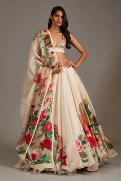 Ivory flared lehenga in organza base with botanical floral print and sequin highlights. Paired with sleeveless plunging V neckline blouse with all over sequin encrustments and printed dupatta.
Components: 3
Pattern: Print 
Type Of Work: Botanical Floral
Neckline: Plunging V Neck
Sleeve Type: Sleeveless
Fabric: Organza, Lining: Cotton
Color: Ivory
Other Details: 
Note: The cancan skirt worn by the model is not for sale
Occasion: Bride, Destination Wedding - Aza Fashions Organza Floral Lehenga, Christmas Outfit Casual, Lehenga Pattern, Desi Dress, Organza Lehenga, Wedding Lehenga Designs, Rohit Bal, Gaun Fashion, Lehenga Style