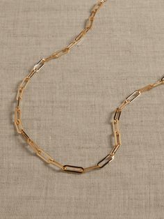 This delicate yet contemporary elongated paperclip chain is perfect for a necklace stack.  Timeless Classics: Luxury, everyday.  A showcase of time-honored craftsmanship and skilled Italian artisans, these are the pieces you'll reach for season after season, delighting in their exceptional versatility and endless appeal.  Lobster clasp.  12K-gold plated or silver-plated bronze.  Made in Italy.  Length: 20" Teen Stuff, Necklace Stack, Beachy Jewelry, Paperclip Chain Necklace, Paperclip Necklace, Paper Chains, Gold Paper, Women's Jewelry And Accessories, Accessories Jewelry Necklace