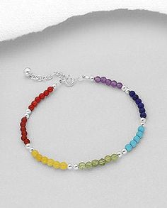 Made by hand in Canadaincludes:1- multi colored genuine gemstones Chakra bracelet 7-8 inches long (adjustable)2-gift box3-rainbow card (made by child)Beautiful gift idea to remind someone you are thinking about them in these difficult times._________Fait au Québec par une joaillière professionelleInclus:- un bracelet ajustable de 7 a 8 poucesPierres semi-précieuses et argent sterling 925 (Améthyste, Corail rouge, Grenat, Lapis Lazuli, Péridot, Turquoise et Agate Jaune) -boite cadeau - Carte arc- Adjustable Rainbow Sterling Silver Jewelry, Multicolor Gemstone Beaded Bracelets As Gift, Hypoallergenic Rainbow Bracelet Jewelry, Spiritual Multicolor Sterling Silver Beaded Bracelets, Multicolor Sterling Silver Jewelry For Birthday, Adjustable Multicolor Beaded Sterling Silver Bracelets, Multicolor Beaded Sterling Silver Bracelets, Multicolor Natural Stones Bracelet In Sterling Silver, Adjustable Multicolor Sterling Silver Beaded Bracelets