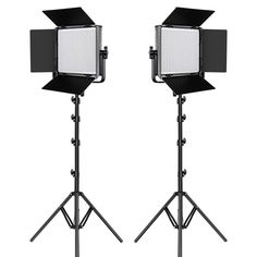 two photography lighting stands with lights on each side and one light on the other side