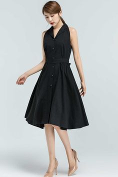 "Elegant and simple design, our black linen dress continue to shows a easy-going attitude of life. The sleeveless summer dress is made of soft linen fabric, with knee length, button down and a tie on the waist. It is a summer handmade dress, is perfect for everyday or special occasion. DETAILS * 50% linen , 50% cotton * No lining * Shirt collar * Sleeveless * Two side seam pockets * Button front closure * Fit and flare dress * Knee Length dress * perfect for Summer * Wash by hand or machine with Elegant A-line Sleeveless Dress With Buttons, Chic Sleeveless A-line Dress With Buttons, Black Sleeveless Button Dress For Summer, Black Knee-length Buttoned Dress, Black A-line Dress With Button Closure, Knee-length Sleeveless Dress With Button Closure For Daywear, Black Sleeveless Dress With Buttons For Spring, Black Sleeveless Dress With Button Closure, Sleeveless Linen Dress For Casual Wear