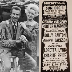 an old photo of a man and woman posing with a guitar in front of a concert poster