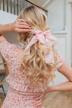 Our bows are the perfect mix of feminine, sophistication, and whimsy! Every Shop Andi accessory is specially designed to be comfortable, stylish, and practical, and our bows are no exception! This triple-long bow is absolutely a must. Made with a sheer fabric with a high sheen, it matches any hairstyle and outfit, seamlessly, and the attached french barrette makes it so easy to apply. Elevate any look instantly with this adorable Andi Bow. 3 colors: cream, light blue, and pink Spring Hair Accessories With Satin Bow, Spring Satin Bow Hair Accessories, Summer Satin Bow Headband, Chic Satin Bow For Spring, Chic Summer Bow, Elegant Spring Hair Accessories With Decorative Bow, Spring Party Hair Accessories With Satin Bow, Summer Bow Headband, Spring Satin Bow Headband