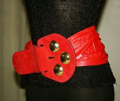 Rare and Original, Vintage belt from the 80s, in soft red leather, beautiful detail on the big red suede buckle, 3 golden half metal studs, balls. The belt end is in red suede too.  Height: 16 cm leather band. length at first hole 76.5 cm. at the last hole 85.5 cm.  Final of the belt, height 8 cm.  Signed  "MARTINICA"  Handmade in Italy. * Good vintage Conditions: new never worn You wear a touch of style of the '80s with belt that seem to get straight from one of the most creative and stimulatin Belt Gold, Hip Belt, Red Belt, Soft Red, Vintage Belt, Metal Ball, Vintage Belts, Suspender Belt, Wide Belt