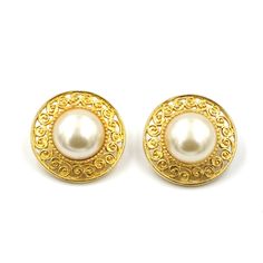 Large 1980s gold tone faux pearl earrings.   Unmarked/unsigned. Some wear to the finish of the pearls and small spots of wear. Measures: 1.24" Diameter Weighs: 22 grams Please feel free to contact me with questions and/or for additional photos. More costume pearls in the shop: Faux pearl necklace - https://etsy.me/3Dy7vH1 Miriam Haskell asymmetrical earrings - https://etsy.me/3tZ8Tiz *Free Domestic Shipping on Orders Over $35* All items ship USPS First Class. Please reach out to me before purcha Vintage Gold Pearl Clip-on Earrings, Asymmetrical Earrings, Faux Pearl Earrings, Costume Earrings, Past Lives, Miriam Haskell, Faux Pearl Necklace, Jewelry Earrings Studs, Statement Jewelry