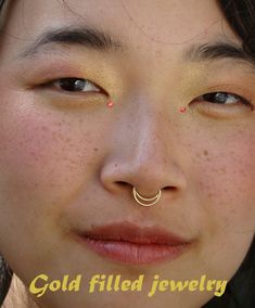 Half moon jewelry This beautiful powerful design , made from gold filled and blessings ~ Can be used as a Septum ring/ Tragus / Single earring / Helix / Rook / Daith earring ~ Size of the nose ring: Inner diameter : 1/4, 5/16 or 3/8 inch (7,8 or 9 mm) Wire gauge : 18 or 16 ( 1 or 1.2 mm) spirals size : 6 mm approximately ~ For larger sizes and special requests please contact me through the' Request custom order' bar. ~To open the ring -gently twist the ends sideways, slip into the hole and then Gold Septum Ring For Everyday Wear, Dainty Gold Septum Ring For Everyday, Everyday Gold Septum Ring, Dainty Gold Internally Threaded Nose Rings, Gold Small Hoop Piercings Internally Threaded, Dainty Gold Hypoallergenic Septum Ring, Gold Internally Threaded Nose Rings, Gold Nickel-free Huggie Nose Rings, Gold Huggie Nose Rings Nickel Free