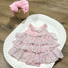 Your little princess will be the star of the show in this thrifted playful romper dress in light pink. The striped top adds a fun twist, while the floral chiffon ruffles and bow add a touch of charm. Perfect for any occasion, this romper dress is as comfortable as it is cute! * Size 3-6M * Bonnie Baby brand * Thrifted/Upcycled Item ------------------------------------------------ Let's get social!     Facebook: https://www.facebook.com/shoplaceanchor  Instagram: https://www.instagram.com/shoplac Bow Outfit, Combi Short, Ruffled Dress, Chiffon Ruffle, Floral Baby, Romper Dress, Floral Chiffon, Baby Romper