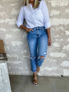 Our new 'Sunfaded Midrise Boyfriend' jeans are designed with a relaxed leg and cuff for the effortless modern look. They feature a mid rise fit, distressing on the thigh, knees, and back pockets and frayed bottom hem for a trendy look - and the light wash is perfect for any spring and summer outfit! Kancan brand denim True to size Rise 9.5", Inseam 27" in size 5/26 99% Cotton, 1% Spandex Machine wash cold and tumble dry low Everyday Light Wash Jeans With Frayed Hem, Light Wash Jeans With Frayed Hem For Everyday, Faded Jeans With Frayed Hem For Everyday Wear, Everyday Ripped Mid-rise Cropped Jeans, Everyday Medium Wash Cropped Jeans With Frayed Hem, Ripped Mid-rise Cropped Jeans For Everyday Wear, Mid-rise Ripped Cropped Jeans For Everyday, Everyday Ripped Cropped Jeans For Fall, Fall Everyday Ripped Cropped Jeans