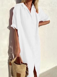 The Casual Button Down Half Sleeves Shirt Dress offers a blend of relaxed style and sophistication with its button-down front and comfortable half sleeves. Perfect for everyday wear, this dress provides a versatile and effortless look that can be easily dressed up or down for any occasion. Buttoned Beach Dress, Solid Button-up Shirt Dress For Vacation, Casual Solid Color Shirt Dress For Vacation, Solid Button-up Shirt Dress For Summer, White Shift Shirt Dress For Summer, Summer Shift Shirt Dress, Summer Solid Shift Shirt Dress, Summer Solid Color Shift Shirt Dress, White Solid Color Shirt Dress For Daywear