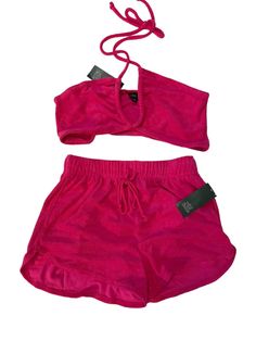 This Pink Terry Cloth Outfit is a must-have for any fashion-forward woman. The set includes shorts and a halter top with tie closure with multiple ways to wear. They both are made of lightweight and breathable materials like polyester, rayon, and cotton. The high waist shorts feature pockets while the halter top has accents like a solid pattern and a Y2k barbie theme. Perfect for summer, this outfit is ideal for a variety of occasions, from casual outings to parties and cocktails. The easy care, non-iron, and stretch features make this outfit convenient to wear and maintain. Get ready to turn heads and make a statement in this stylish and comfortable outfit. So cute. I bought this year and never had a chance to wear. If more photos needed please ask. Fast shipping. Terry Cloth Outfit, Y2k Barbie, Outfit Shorts, Acid Wash Shorts, Cheeky Shorts, Barbie Theme, Mom Denim, Comfortable Outfit, Paper Bag Shorts