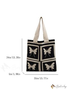 a black and white tote bag with butterflies on the front, measurements for it