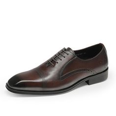 Introducing the ExoticaLux Pointed Toe Brogue Shoes, crafted with genuine cow leather for the utmost sophistication and style. With a pointed toe shape and lace-up closure, these shoes exude elegance and ensure a secure and comfortable fit. The rubber outsole provides excellent traction, making them suitable for any occasion. Elevate your style to new heights with the timeless and versatile ExoticaLux Pointed Toe Brogue Shoes. Order your pair today and step into a world of sophistication. Brown Oxfords For Business With Snip Toe, Brown Snip Toe Oxfords For Business, Brown Pointed Toe Goodyear Welted Oxfords, Brown Pointed Toe Oxfords With Goodyear Welting, Brown Pointed Toe Dress Shoes With Leather Lining, Brown Pointed Toe Oxfords With Leather Lining, Brown Leather Shoes With Brogue Detailing And Pointed Toe, Brown Cap Toe Dress Shoes For Office, Elegant Pointed Toe Oxfords With Perforated Toe Box