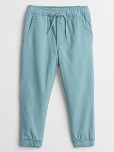 Toddler Jersey-Lined Joggers | Gap Factory Casual Spring Joggers With Pull-on Style, Everyday Spring Bottoms With Drawstring, Casual Bottoms With Elastic Side Panels For Summer, Casual Summer Bottoms With Elastic Side Panels, Everyday Sweatpants With Pockets, Everyday Solid Color Pants With Drawstring, Everyday Drawstring Pants, Summer Pants With Drawstring For Everyday Wear, Casual Cotton Sweatpants With Pull-on Style