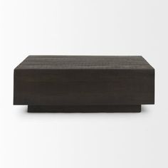 a wooden box sitting on top of a white surface