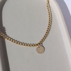 Be your own muse with this newest necklace featuring our Demi Alexandra Chain. Customize the disc charms with your initials or those of your loved ones. We think this would make a perfect Mother's Day gift, too! You can choose up to 6 tags to add! DETAILS 14k gold fill Choose up to 6 personalized discsAvailable in 14", 16" or 18" lengths Hypoallergenic, waterproof and nickel free3/8" discs Personalized Yellow Gold Coin Necklace, Round Disc Charm Necklace With Adjustable Chain, Personalized Yellow Gold Circular Jewelry, Personalized Yellow Gold Circle Necklace, Initial Pendant Coin Necklace With Adjustable Chain As Gift, Coin Necklace With Initial Pendant And Adjustable Chain, Minimalist Round Disc Charm Necklace With Adjustable Chain, 14k Gold Round Disc Charm Necklace Tarnish Resistant, Everyday Coin Necklace With Round Pendant