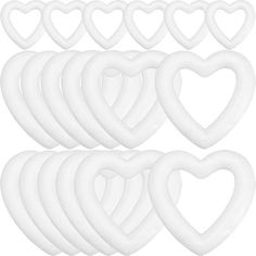 white heart shapes are arranged in the shape of an occupant, on a white background