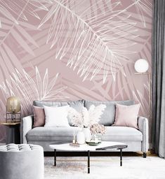 a living room with pink and grey wallpaper