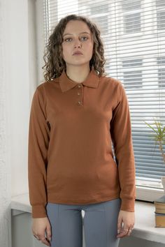 Vintage 80's brown long sleeved polo top. 65% polyester, 35% cotton. UK size written 6-8. Model size on the photo is 8. Measurements: length 23.6 inches, sleeve 23.2 inches, chest 41.7 inches, waist 39.3 inches. Fabric is stretchy. Polo Top, High Neck Top, Belted Coat, Green Wool, Vintage Coat, A Line Skirts, Womens Clothing Tops, 6 Inches, Vintage Ladies