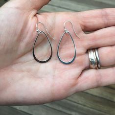 "MATERIALS These simple sterling silver earrings are the perfect size to wear everyday. They have polished silver on both sides. These teardrop earrings shine through with even long hair. These are perfect earrings to dress up or down with all your outfits. MEASUREMENTS 1 1/2\" long including the ear wire 11/16\" wide Oval drop measures 1 1/8\" long. FAST SHIPPING: I ship the next business day (Mon-Friday) for all orders. PACKAGING: Each jewelry purchase is secured in a gift giving jewelry box & Silver Single Drop Earring As Gift, Sterling Silver Single Teardrop Earrings, Hypoallergenic Long Drop Earrings For Everyday, Everyday Hypoallergenic Long Drop Earrings, Classic Sterling Silver Single Teardrop Earring, Single Long Drop Teardrop Earring For Everyday, Modern Sterling Silver Pear-shaped Earrings, Simple Everyday Teardrop Jewelry, Nickel Free Teardrop Pendant Earrings