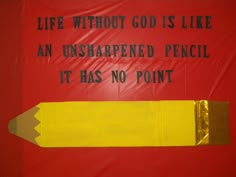 there is a sign that says life without god is like an unshapped pencil it has no point