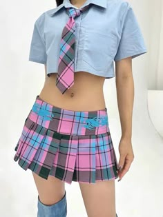 Y2K Aesthetic Gyaru Low Rise Pleated Skirt Size S Waist: 66cm/25.9" Length(waist to hem):24cm/9.4"Size M Waist: 70cm/27.5" Length(waist to hem):25cm/9.8"Size L Waist: 74cm/29.1" Length(waist to hem):26cm/10.2" Size XL Waist: 78cm/30.7" Length(waist to hem):27cm/10.6" Prepare to grab attention with our Y2K Aesthetic Gyaru Low Rise Pleated Skirt. This plaid mini skirt blends early 2000s trends with Japanese gyaru fashion, making it an essential for Harajuku fashion aficionados.Featuring a Y2K-inspired tribal tattoo motif embroidered along the sides and back, this skirt exudes edgy charm, reminiscent of the rebellious spirit of the Y2K era. Its low-rise fit and ultra mini length perfectly embodies the Y2K editorial vibes. Worried about practicality? Fear not! This pink pleated skirt includes Harajuku Style Fitted Mini Skirt For School, Harajuku Style Bottoms For School In Spring, Harajuku High-waisted Bottoms For School, Harajuku High Waist Bottoms For School, School-style Harajuku Mini Skirt, Pink Harajuku Style Skort, Harajuku Style Fitted Mini Skirt For Summer, Summer Harajuku Fitted Mini Skirt, Harajuku Pink Mini Skort