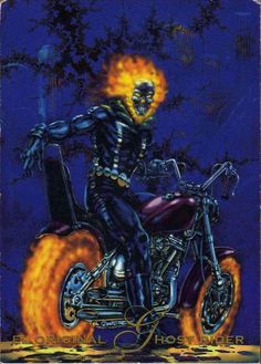 a man riding on the back of a motorcycle with flames coming out of his tires