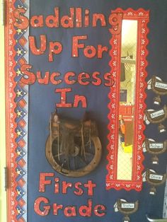 a door decorated with an old cowboy's boot and the words, saddleing up for success in first grade