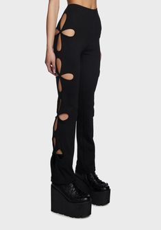 Flare Pants Rave Outfit, Side Cut Out Pants, Edgy Black Bottoms With Holes, Edgy Elastane Pants For Night Out, Edgy Stretch Elastane Pants, Edgy Straight Leg Bottoms With Holes, Fitted Cutout Bottoms For Night Out, Edgy Stretch Bottoms With Holes, Edgy Stretch Flare Pants