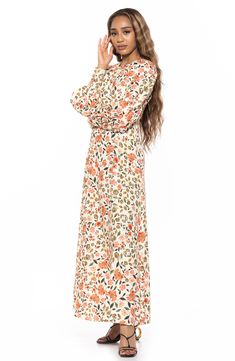 With voluminous long sleeves and an eye-catching empire waist, this maxi dress is an elegant piece you'll love to style. 56" length (size 2) Back zipper closure Jewel neck Long sleeves Lined 100% polyester Machine wash, line dry Imported Long Sleeve Maxi Dress For Fall Brunch, Fall Long Sleeve Maxi Dress For Brunch, Billowy Long Sleeve Floral Maxi Dress, Modest Billowy Maxi Dress, Modest Maxi Dress With Elastic Sleeves, Fall Floor-length Maxi Dress, Chic Maxi Dress With Blouson Sleeves, Feminine Long Sleeve Maxi Dress With Gathered Sleeves, Flowy Long Sleeve Midi Dress For Fall