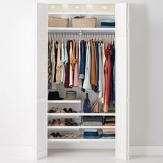 an organized closet with clothes and shoes