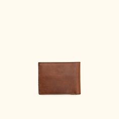 Dakota Leather Bifold Wallet | Chestnut Brown hover Vintage Brown Bifold Wallet For Daily Use, Leather Trifold Wallet With Waxed Finish For Everyday Use, Bifold Waxed Finish Wallets For Everyday Carry, Classic Rectangular Wallet With Waxed Finish, Vintage Brown Bifold Wallet For Everyday Use, Brown Trifold Wallets For Daily Use, Vintage Brown Bifold Wallet, Leather Bifold Wallet With Waxed Finish, Classic Trifold Wallet With Waxed Finish