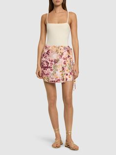 Side self-tie closure . All over print placement may vary. Model is wearing a sizeXS/S Mini Wrap Skirt, Evening Floral Print V-neck Mini Dress, Versace Brand, Ski Accessories, Jeans Jumpsuit, Flat Espadrilles, Swim Accessories, Heeled Loafers, Shearling Jacket