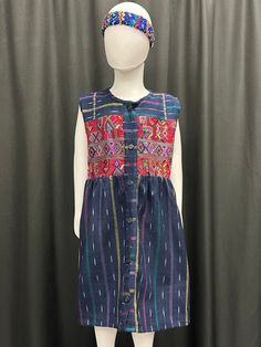 "This beautiful handmade dress reflects Guatemala's cultures through its vibrants colors and patterns. It has straps on the back for an adjustable fit. The dress has patchwork from different cities in Guatemala such as: Solola, Huhuetenango, Quiche and Sacatepequez. Size runs small. I would suggest to get one to two sizes bigger. Measurements: Armpit to armpit: 16\" Collar to bottom: 27\" Caring Instructions; - Wash separate with cold water - Air Dry or Lay Flat" Multicolor Woven Motifs Dresses For Festivals, Multicolor Dresses With Woven Motifs For Festivals, Multicolor Summer Dresses With Traditional Patterns, Multicolor Dresses With Traditional Patterns For Summer, Festive Multicolor Dresses With Woven Motifs, Festive Multicolor Dress With Woven Motifs, Bohemian Multicolor Dresses With Weaving Work, Traditional Cotton Festival Dresses, Cotton Dresses With Traditional Patterns For Festival