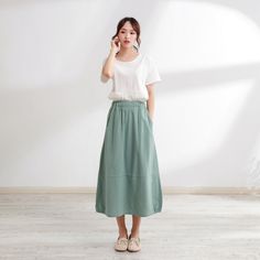 Size Chart :  It is the garment's measurements, Not body measurements . Size XS:  Flexible Waist: 65cm-80cm（25.6"-29.5"）, Length: 75 cm （29.5"） Size S: Flexible Waist: 70cm-85cm（27.5"-33.5"）, Length: 75 cm （29.5"） Size M: Flexible Waist: 75cm-90cm（29.5"-35.5"）, Length: 75 cm （29.5"） Size L: Flexible Waist: 80cm-95cm（31.5"-37.5"）, Length: 75 cm （29.5"） Size XL: Flexible Waist: 90cm-105cm（35.5"-41.5"）, Length: 75 cm （29.5"） Size XXL: Flexible Waist: 100cm-115cm（39.5"-45.5"）, Length: 75 cm （29.5"） Size 3XL: Flexible Waist: 110cm-125cm（43.5"-49.5"）, Length: 75 cm （29.5"） Size 4XL: Flexible Waist: 120cm-135cm（47.5"-53.5"）, Length: 75 cm （29.5"） Size 5XL: Flexible Waist: 130cm-145cm（51.5"-57.5"）,  Length: 75 cm （29.5"） Size 6XL: Flexible Waist: 140cm-150cm（56.5"-63.5"）,  Length: 75 cm （29.5"） 🌸 Green Cotton Skirt With Pockets, Cotton Tiered Skirt With Solid Color, Cotton Tiered Skirt In Solid Color, Spring Cotton Pencil Skirt With Pockets, Solid Color Midi Skirt With Pockets, Solid Color Relaxed Cargo Skirt With Pockets, Relaxed Solid Cargo Skirt With Pockets, Relaxed Cargo Skirt With Pockets, Solid Color Tiered Skirt With Pockets