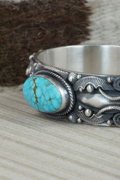 Turquoise & Sterling Silver Bracelet - Derrick Gordon – High Lonesome Trading Southwestern Style Stamped Turquoise Bracelets, Southwestern Style Turquoise Stamped Bracelets, Southwestern Style Sterling Silver Turquoise Bracelet, Southwestern Stamped Turquoise Sterling Silver Bracelet, Southwestern Turquoise Stamped Sterling Silver Bracelet, Western Style Turquoise Stamped Bracelets, Turquoise Western Style Collectible Bracelets, Western Turquoise Bracelet With Concho, Western Turquoise Bracelets With Concho