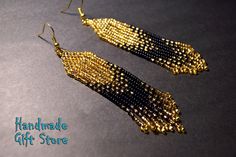 black and gold beaded earrings on a gray background with the words handmade gift store written below it