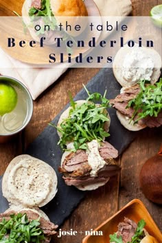 sandwiches on the table with text overlay that reads on the table beef tenderie sliders