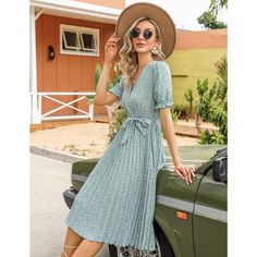 This women's summer beach dress is made from soft, comfortable, and breathable fabric ideal for summer wear. It features a wrap V-neck, printed design, pleated details, short lantern sleeves, elastic high waist, A-line silhouette, elegant hem, and belt for a casual yet elegant look. Suitable for various occasions like school, work, beach outings, weddings, and more, the dress can be dressed up or down for a lively and elegant appearance. Pair with high heels, wedges, flats, or sandals for a styl Non-stretch Dresses For Summer Beach, Non-stretch Beach Dress For Summer, Non-stretch Summer Beach Dress, Non-stretch Midi Dress For Summer Beach, Non-stretch Midi Dress For Beach In Summer, Spring Beach Maxi Dress Non-stretch, Non-stretch Maxi Dress For Spring Beach Occasions, Spring Beach Non-stretch Maxi Dress, Breezy Short Sleeve Dress For Spring