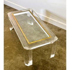 Width: 110 centimeters Height: 41 centimeters Depth: 54 centimeters 1980s acrylic glass and Glass coffee table, a stunning piece of furniture that exudes elegance and sophistication. The glass top is clear and allows you to see the faceted acrylic glass pillar base that supports it. The glass top is surrounded by a brass rim. The table is crafted from high-quality and very thick 6cm acrylic glass which is known for its transparency, durability, and ability to refract light. The faceted design of the base adds depth and texture to the overall look of the table. This coffee table is not only a functional piece of furniture but also a work of art that will add style and elegance to any living room or family room. Its timeless design ensures that it will remain a staple in your home decor for Chunky Table, Lucite Coffee Table, Lucite Table, Faceted Design, Couch Table, Brass Table, Glass Plate, Glass Coffee Table, Glass Plates