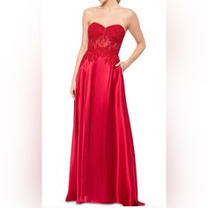 Please Note This Dress Is New But Missing The String To Tie The Dress. Currently, On Macy’s Website For $269.00. Imported Sweetheart Strapless Neckline; Gown Silhouette Floor-Length Formal Dress Lined Lace At Bodice Back Zipper Closure; Lace-Up Detail At Back Bodice Size & Fit Approx. 60-1/2" Long From Center Back Neck To Hem. Length Is Based On Size 5 And Varies 1/2" Between Sizes Charmeuse Gown, Strappy Gown, Black Formal Gown, Red Halter Dress, Emerald Green Prom Dress, Gown Silhouette, Winter Formal Dresses, Printed Gowns, Formal Dresses Gowns