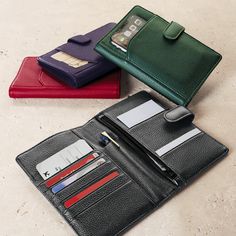 A convenient RFID-protected leather wallet made for the savvy traveler. Keep your travel documents and smartphone ready to go in our Getaway Wallet, crafted in softly pebbled full-grain leather. With plenty of card, cash and ticket pocketing and a secure tab closure, you can keep exactly what you need at your fingertips as you go through airport checkpoints. It features a pen sleeve so you can take your favorite pen with you and take notes on the 3 x 5 note cards included. Add a monogram for a p Personalized Stocking Stuffers, Travel Documents, New Pen, Personalized Stockings, Stocking Stuffer Gifts, Travel Wallets, Travel Tote, Travel Case, Travel Gear