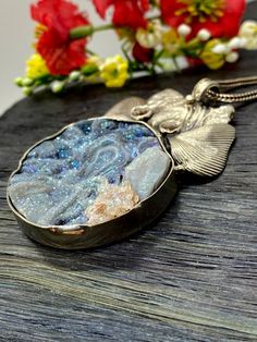 "Artisan Rainbow Druzy pendant comes with 20\" silver chain Hand-made Sterling Silver 925. Stones used: Rainbow Druzy, Pink Tourmaline. Height -2 1/2\" (including bail), Width - 1 3/4\" Height - 65mm (including bail), Width - 45mm Unique Handcrafted One-of a-kind Design Pendant Each Piece of Jewelry in my Collection is Absolutely One of a Kind! When you start wearing a piece of my jewelry you will fall in love with it more and more each day and feel that good Energy and Love that I pass into it Luxury Untreated Jewelry For Gift, White Gold Fusion Necklace Gift, White Gold Fusion Necklace For Gift, Luxury Untreated Jewelry As A Gift, Fusion Style White Gold Necklace For Gift, Spiritual Jewelry With Large Stone Pendant, Unique Polished Pendant Necklace, Healing Pendant Jewelry With Large Stone, Spiritual Large Stone Pendant Jewelry