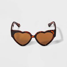 Accessorize your kid's ensemble with this Girls' Plastic Heart Sunglasses by Cat & Jack™. Designed for ages 10-12, these brown heart-shaped sunglasses provide maximum UV protection for their delicate eyes. The stylish brown frames complement the brown lenses, offering a chic look. Perfect for sunny days, these heart sunglasses from Cat & Jack ensures your child stays protected while making her outfit trendy. Cat & Jack™: Kids’ clothing with an imagination of its own Brown Heart, Shaped Sunglasses, Heart Shaped Sunglasses, Heart Sunglasses, Cat & Jack, Art Class, Girls Shopping, Kids Clothing, Dress Accessories