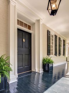 an image of a black front door on the app store's home page for real estate