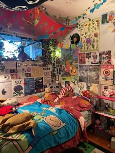 a bed room with a neatly made bed and posters on the wall